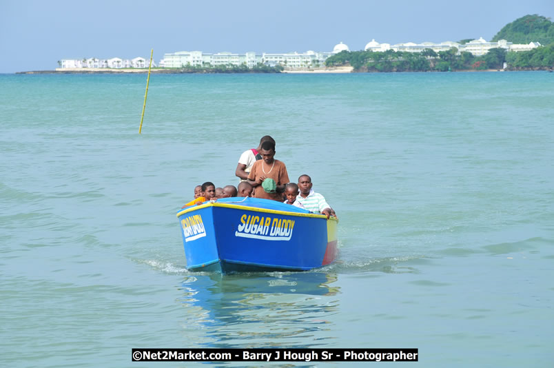 Lucea Cross the Harbour @ Lucea Car Park - All Day Event - Cross the Harbour Swim, Boat Rides, and Entertainment for the Family - Concert Featuring: Bushman, George Nooksl, Little Hero, Bushi One String, Dog Rice and many local Artists - Friday, August 1, 2008 - Lucea, Hanover Jamaica - Photographs by Net2Market.com - Barry J. Hough Sr. Photojournalist/Photograper - Photographs taken with a Nikon D300 - Negril Travel Guide, Negril Jamaica WI - http://www.negriltravelguide.com - info@negriltravelguide.com...!