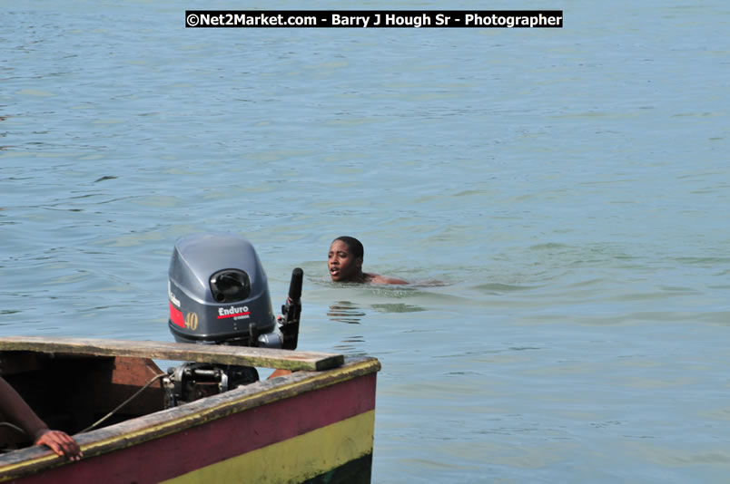 Lucea Cross the Harbour @ Lucea Car Park - All Day Event - Cross the Harbour Swim, Boat Rides, and Entertainment for the Family - Concert Featuring: Bushman, George Nooksl, Little Hero, Bushi One String, Dog Rice and many local Artists - Friday, August 1, 2008 - Lucea, Hanover Jamaica - Photographs by Net2Market.com - Barry J. Hough Sr. Photojournalist/Photograper - Photographs taken with a Nikon D300 - Negril Travel Guide, Negril Jamaica WI - http://www.negriltravelguide.com - info@negriltravelguide.com...!