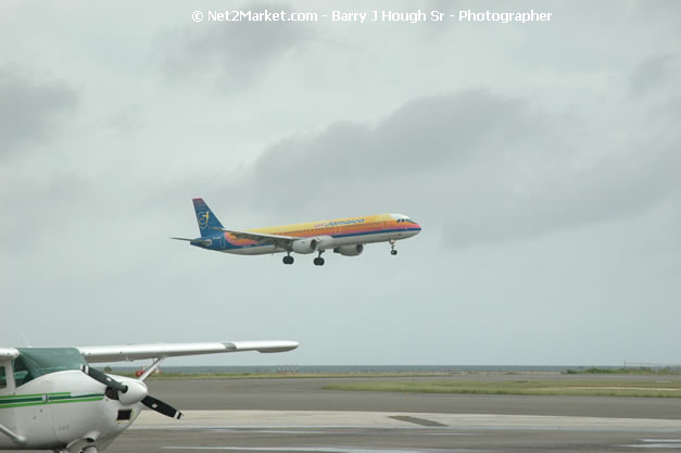 Air Jamaica Airline - Landing & Take Off - MBJ Airports Limited - Sangster International Airport - Domestic Terminal - Montego Bay, St James, Jamaica W.I. - MBJ Limited - Transforming Sangster International Airport into a world class facility - Photographs by Net2Market.com - Negril Travel Guide, Negril Jamaica WI - http://www.negriltravelguide.com - info@negriltravelguide.com...!