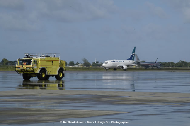 MBJ Airports Limited Welcomes WestJet Airlines - Inaugural Scheduled Service From Toronto Pearsons International Airport - Monday, December 10, 2007 - Sangster International Airport - MBJ Airports Limited, Montego Bay, Jamaica W.I. - Photographs by Net2Market.com - Barry J. Hough Sr, Photographer - Negril Travel Guide, Negril Jamaica WI - http://www.negriltravelguide.com - info@negriltravelguide.com...!