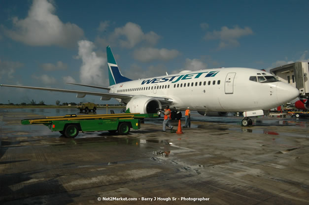 MBJ Airports Limited Welcomes WestJet Airlines - Inaugural Scheduled Service From Toronto Pearsons International Airport - Monday, December 10, 2007 - Sangster International Airport - MBJ Airports Limited, Montego Bay, Jamaica W.I. - Photographs by Net2Market.com - Barry J. Hough Sr, Photographer - Negril Travel Guide, Negril Jamaica WI - http://www.negriltravelguide.com - info@negriltravelguide.com...!