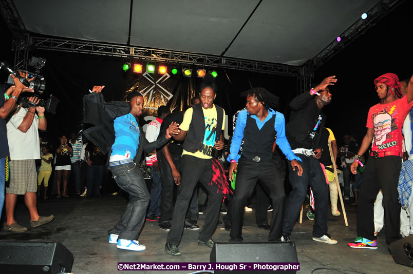 Usain Bolt of Jamaica - The Fastest Man In The World  - Usain Bolt Homecoming Celebrations Concert at the William Knibb High School Play Field, Trelawny - Ice, Ding Dong, Ravers Clavers, D'Angel, Voicemail, RDX and Dancers, Wayne Marshall, Tammi Chynn, Bugle, Nero, Tanya Stephens, Richie Spice, Kip Rich,and Shaggy - Photographs by Net2Market.com - Barry J. Hough Sr. Photojournalist/Photograper - Photographs taken with a Nikon D300 - Negril Travel Guide, Negril Jamaica WI - http://www.negriltravelguide.com - info@negriltravelguide.com...!