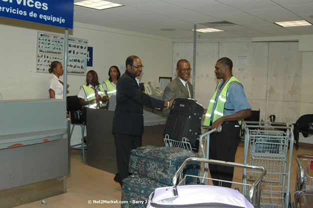 Minister of Tourism, Hon. Edmund Bartlett - Director of Tourism, Basil Smith, and Mayor of Montego Bay, Councillor Charles Sinclair Launch of Winter Tourism Season at Sangster International Airport, Saturday, December 15, 2007 - Sangster International Airport - MBJ Airports Limited, Montego Bay, Jamaica W.I. - Photographs by Net2Market.com - Barry J. Hough Sr, Photographer - Negril Travel Guide, Negril Jamaica WI - http://www.negriltravelguide.com - info@negriltravelguide.com...!