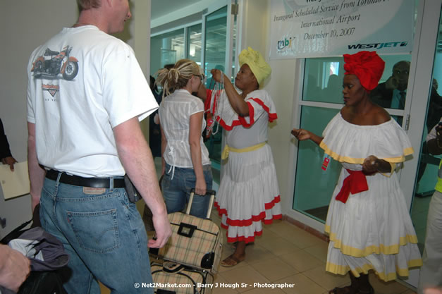 MBJ Airports Limited Welcomes WestJet Airlines - Inaugural Scheduled Service From Toronto Pearsons International Airport - Monday, December 10, 2007 - Sangster International Airport - MBJ Airports Limited, Montego Bay, Jamaica W.I. - Photographs by Net2Market.com - Barry J. Hough Sr, Photographer - Negril Travel Guide, Negril Jamaica WI - http://www.negriltravelguide.com - info@negriltravelguide.com...!