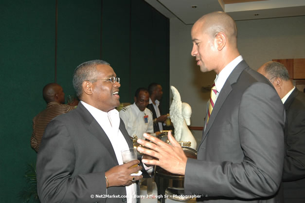 Red Cap Porters Awards - Minister of Tourism, Hon. Edmund Bartlett - Director of Tourism, Basil Smith - Friday, December 14, 2007 - Holiday Inn Sunspree, Montego Bay, Jamaica W.I. - Photographs by Net2Market.com - Barry J. Hough Sr, Photographer - Negril Travel Guide, Negril Jamaica WI - http://www.negriltravelguide.com - info@negriltravelguide.com...!