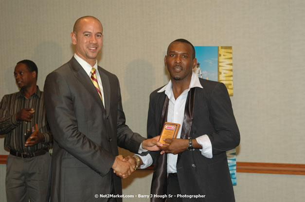 Red Cap Porters Awards - Minister of Tourism, Hon. Edmund Bartlett - Director of Tourism, Basil Smith - Friday, December 14, 2007 - Holiday Inn Sunspree, Montego Bay, Jamaica W.I. - Photographs by Net2Market.com - Barry J. Hough Sr, Photographer - Negril Travel Guide, Negril Jamaica WI - http://www.negriltravelguide.com - info@negriltravelguide.com...!