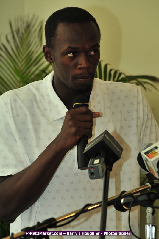 Usain Bolt of Jamaica - The Fastest Man In The World  - Usain Bolt Homecoming Celebrations - Press Conference at the Grand Bahia Principe &amp; Sherwood Content - Waldensia Primary School - Photographs by Net2Market.com - Barry J. Hough Sr. Photojournalist/Photograper - Photographs taken with a Nikon D300 - Negril Travel Guide, Negril Jamaica WI - http://www.negriltravelguide.com - info@negriltravelguide.com...!